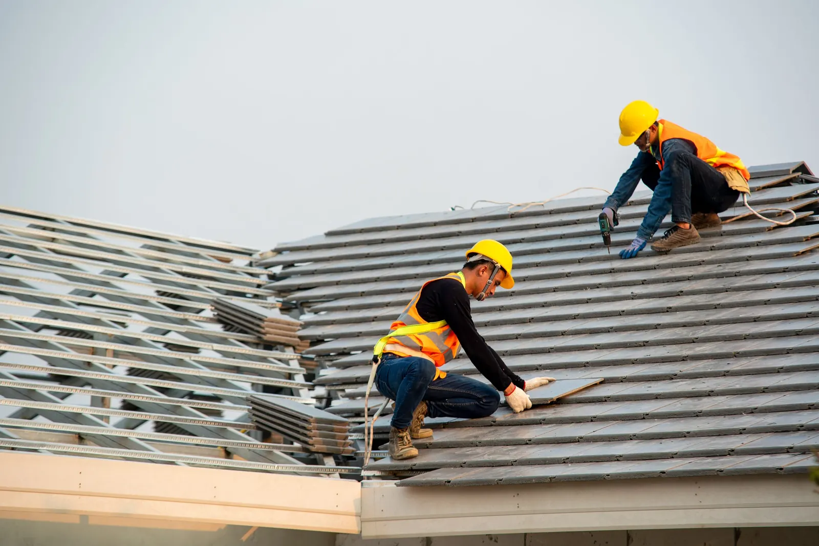 Roofing contractors on site